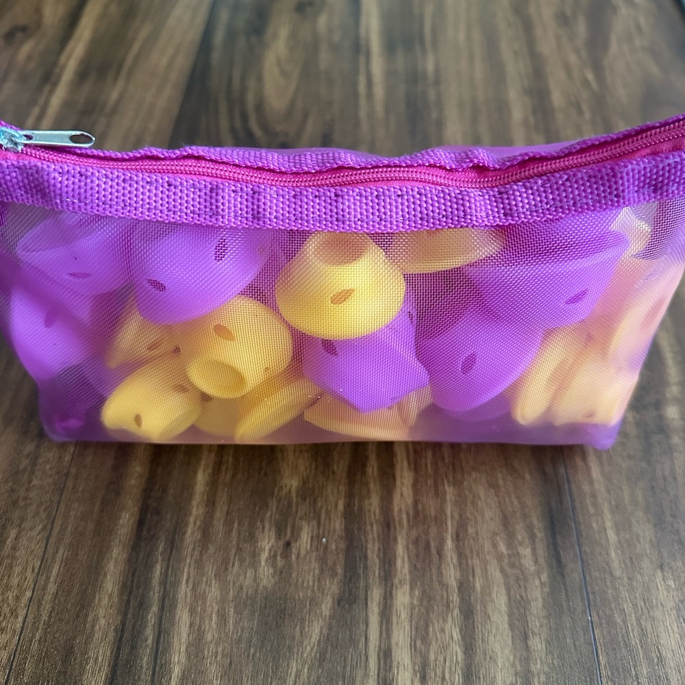 Purple Mesh Pouch Filled with Yellow & Purple heatless curlers